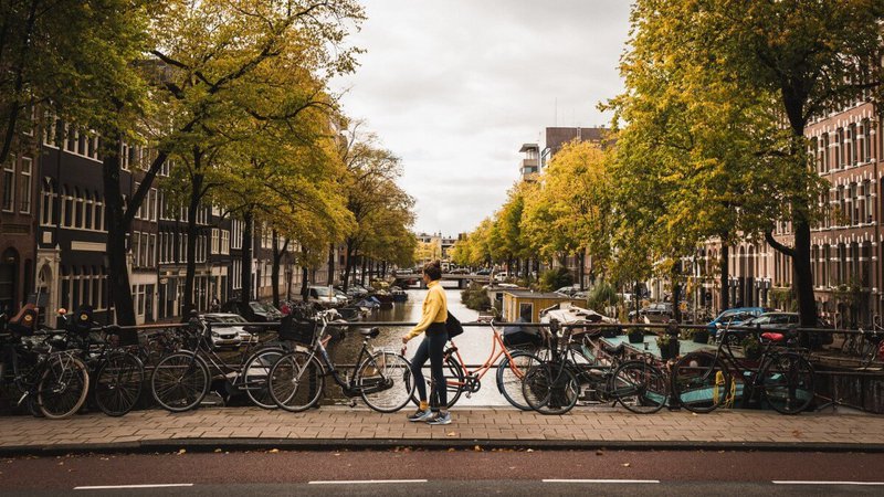 A student walking in Amsterdam