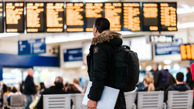 man waiting in airport