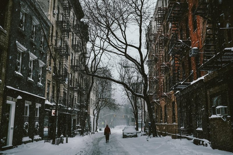 person walking the snowy New York